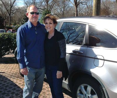 Jim and Kay Fulp, with “the little Honda that could.” Photo/Special.