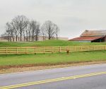 Over the berm and through the field to ... Pinewood we go — Green grass covers new berms shielding parts of Pinewood Atlanta Studios from Sandy Creek Road passersby. One of the soundstages will host the gala grand opening of the facility this weekend. Photo/ Ben Nelms.