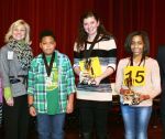 The final three competitors out of 25 in the Jan. 9 Coweta County Spelling Bee are honored above by the bee’s organizers and sponsor. Pictured, from left, are Coweta County curriculum directors Therese Reddekopp and Karen Barker, along with 3rd place winner Tevyn Fudge (Arnall Middle School), 1st place winner Natalie Caylor (Madras Middle School), 2nd place winner Dynahsty James (Lee Middle School) and Garnett Reynolds of BB&T Bank of Newnan, which sponsored this year’s bee. Photo/Special.